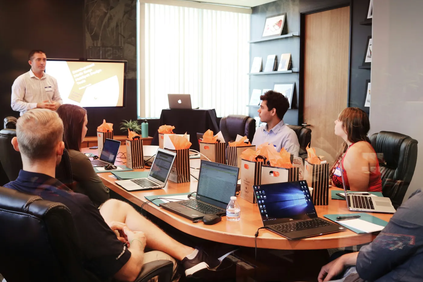 Professional presenting a growth strategy to their team